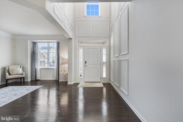 10815 Flying Change Ct, Upper Marlboro, MD 20772 - foyer entrance featuring baseboards, crown molding, and dark wood-style floors