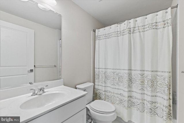 10815 Flying Change Ct, Upper Marlboro, MD 20772 - bathroom with toilet, vanity, and a shower with shower curtain