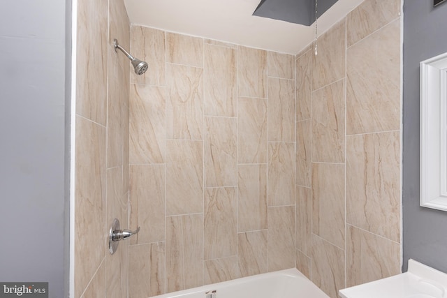 bathroom featuring  shower combination