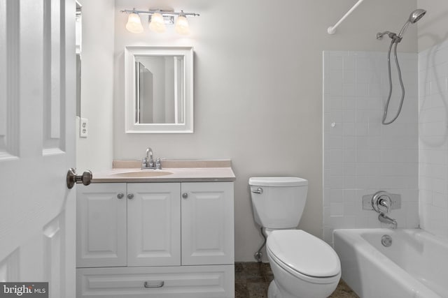 bathroom featuring shower / bathing tub combination, vanity, and toilet