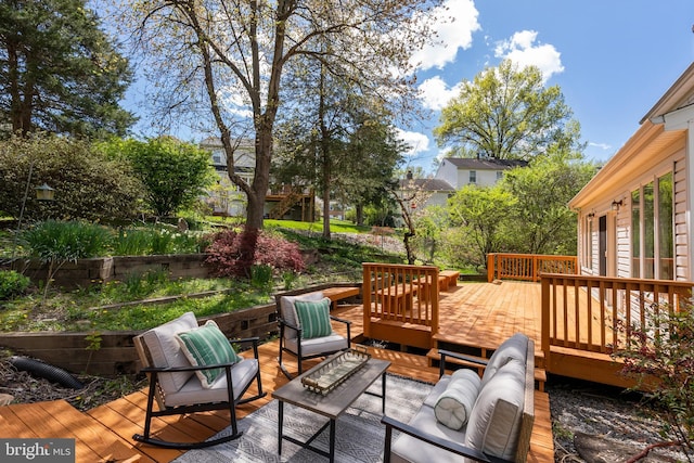 deck featuring outdoor lounge area