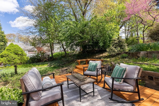 view of patio featuring a deck and an outdoor hangout area
