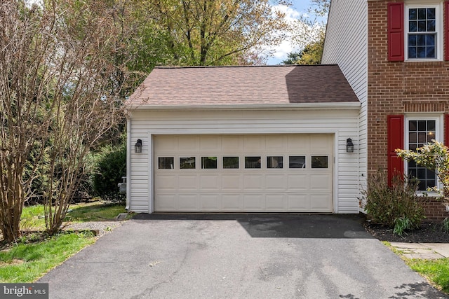 garage with driveway