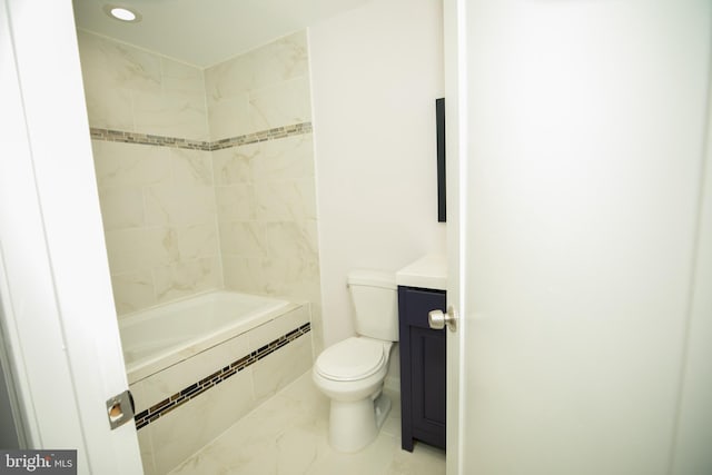 full bathroom featuring vanity, marble finish floor, and toilet