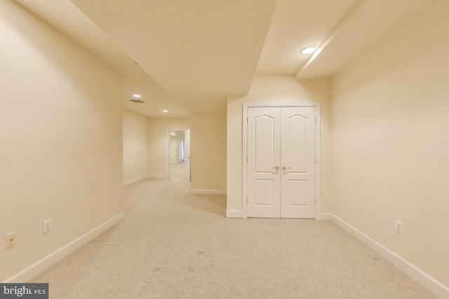 interior space featuring recessed lighting, carpet flooring, and baseboards