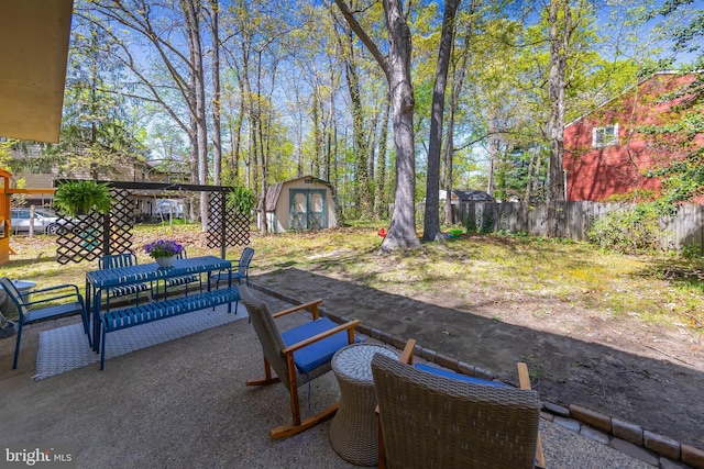 2 White Birch Ct, Turnersville, NJ 08012 - view of patio / terrace with fence, an outbuilding, outdoor dining space, and a shed