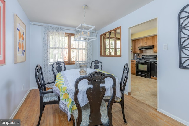 2 White Birch Ct, Turnersville, NJ 08012 - dining area with baseboards, light wood-style flooring, and a notable chandelier