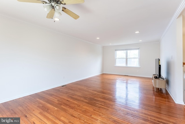7301 Belinger Ct, Springfield, VA 22150 - unfurnished living room with baseboards, ornamental molding, and light wood-type flooring