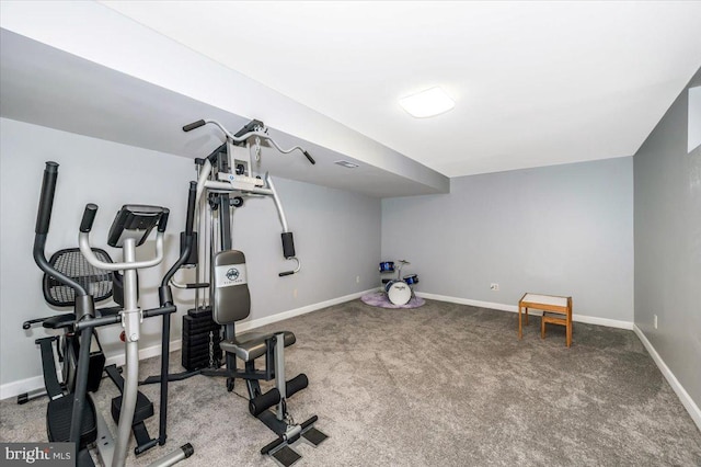 workout area with carpet floors and baseboards
