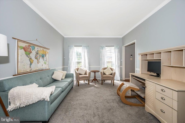 living room with built in desk, crown molding, and carpet floors