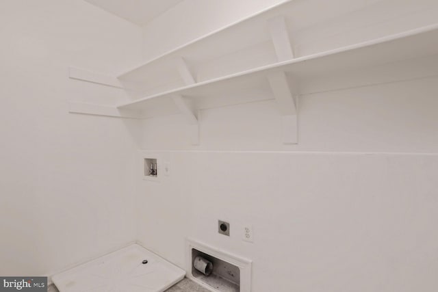 clothes washing area with hookup for an electric dryer, laundry area, and hookup for a washing machine