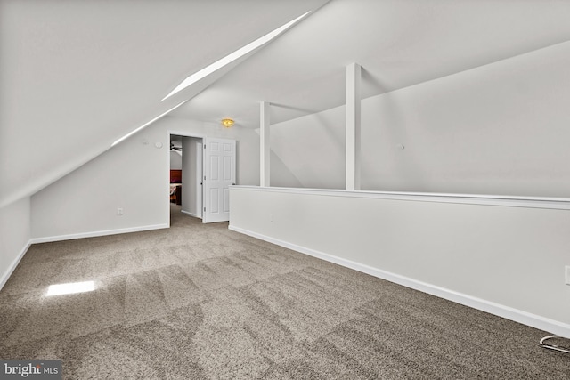 111 S Newport Way, Dagsboro, DE 19939 - bonus room with baseboards, lofted ceiling, and carpet