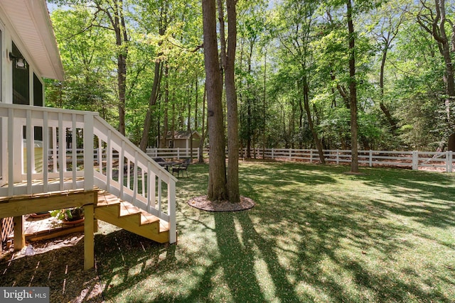 111 S Newport Way, Dagsboro, DE 19939 - view of yard featuring a fenced backyard, a deck, and stairway