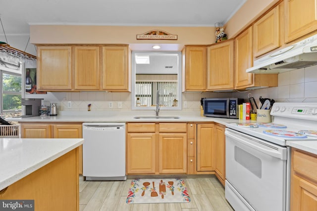 605 Old Post Ct, Bethany Beach, DE 19930 - kitchen featuring under cabinet range hood, light brown cabinetry, and white appliances