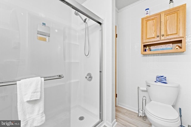 605 Old Post Ct, Bethany Beach, DE 19930 - full bathroom with a shower stall, toilet, and wood finished floors