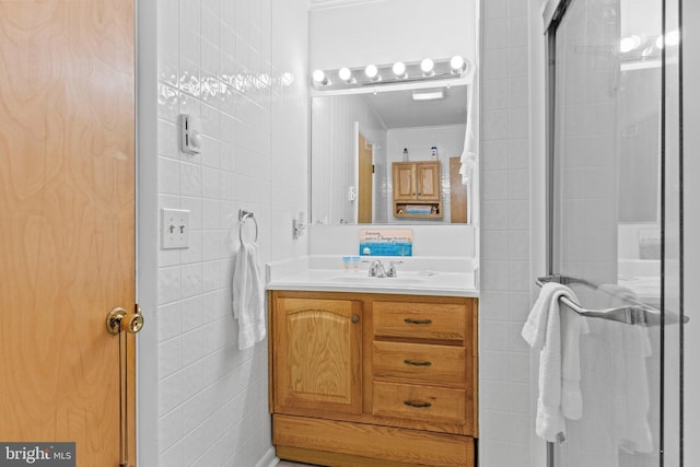 605 Old Post Ct, Bethany Beach, DE 19930 - full bath with vanity, a stall shower, and tile walls