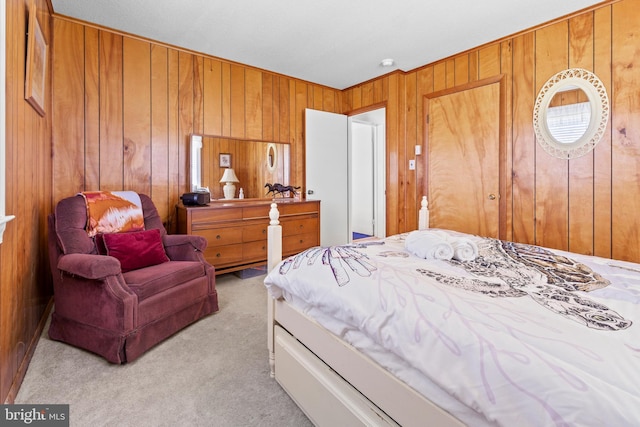 605 Old Post Ct, Bethany Beach, DE 19930 - bedroom featuring wooden walls and light carpet