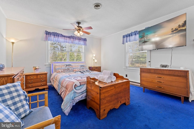 605 Old Post Ct, Bethany Beach, DE 19930 - bedroom featuring visible vents, carpet floors, a textured ceiling, and multiple windows
