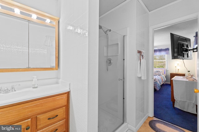 605 Old Post Ct, Bethany Beach, DE 19930 - ensuite bathroom with a shower stall, ensuite bath, and vanity