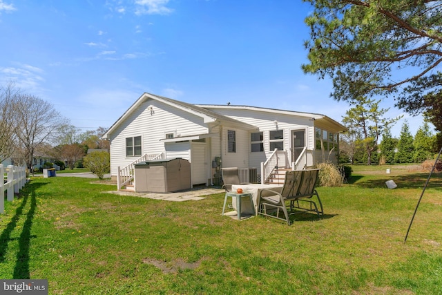 605 Old Post Ct, Bethany Beach, DE 19930 - back of house with a lawn, central AC unit, and stairs