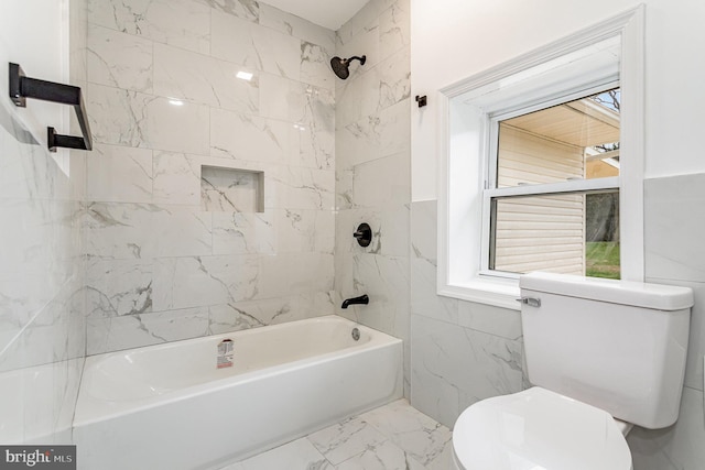 full bath featuring shower / tub combination, marble finish floor, toilet, and a healthy amount of sunlight