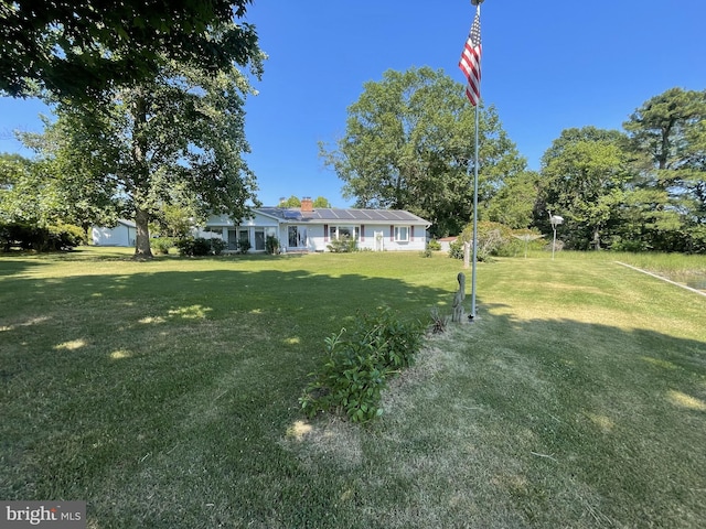 view of front of house with a front lawn