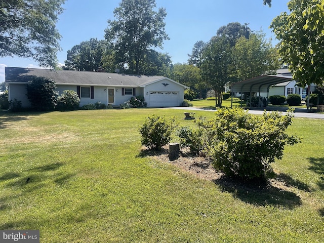 view of front facade featuring a detached carport, a garage, a front yard, and driveway