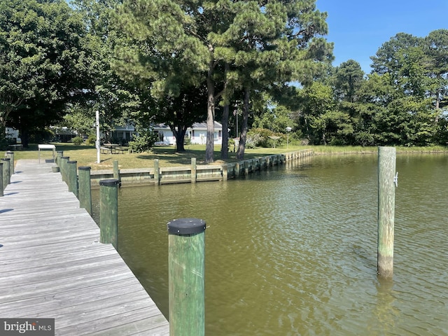 view of dock with a water view