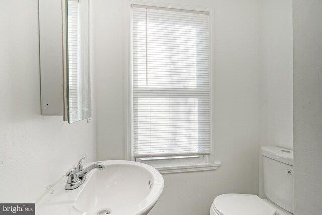 417 E Main St, Millville, NJ 08332 - half bathroom with toilet and a sink