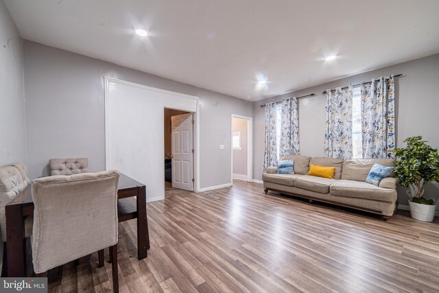 417 E Main St, Millville, NJ 08332 - living area featuring wood finished floors and baseboards