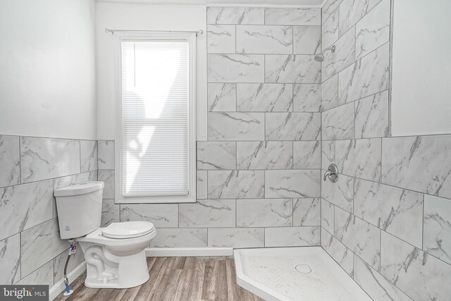 417 E Main St, Millville, NJ 08332 - bathroom with toilet, wood finished floors, and a tile shower