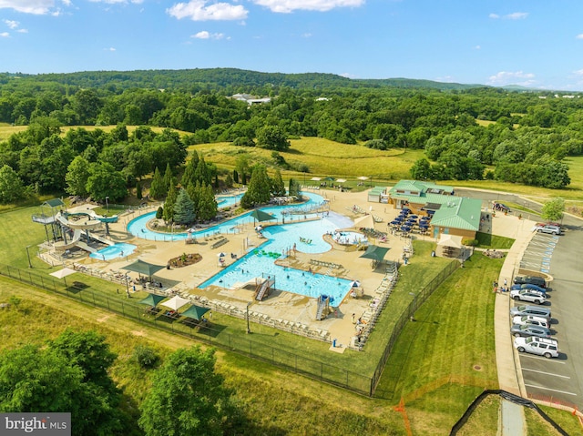 43417 Lost Corner Rd, Leesburg, VA 20176 - drone / aerial view of a heavily wooded area and a pool area