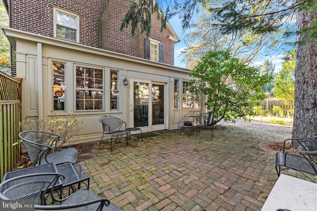 view of patio / terrace featuring fence