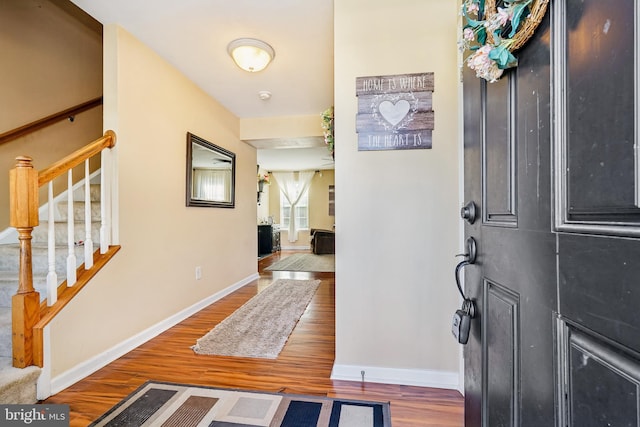 122 Abbigail Xing, Townsend, DE 19734 - foyer with stairway, baseboards, and wood finished floors