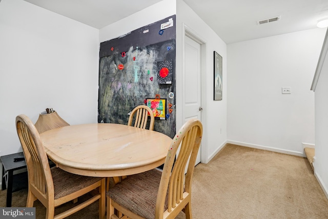 122 Abbigail Xing, Townsend, DE 19734 - dining area with baseboards, visible vents, and light colored carpet