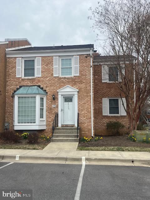 474 Colonial Ridge Ln, Arnold, MD 21012 - multi unit property featuring brick siding, uncovered parking, and entry steps
