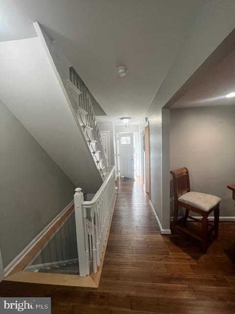 474 Colonial Ridge Ln, Arnold, MD 21012 - corridor with hardwood / wood-style flooring, baseboards, and stairway