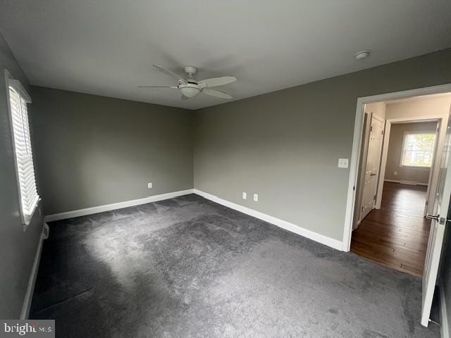 474 Colonial Ridge Ln, Arnold, MD 21012 - empty room with ceiling fan, baseboards, dark colored carpet, and a smoke detector