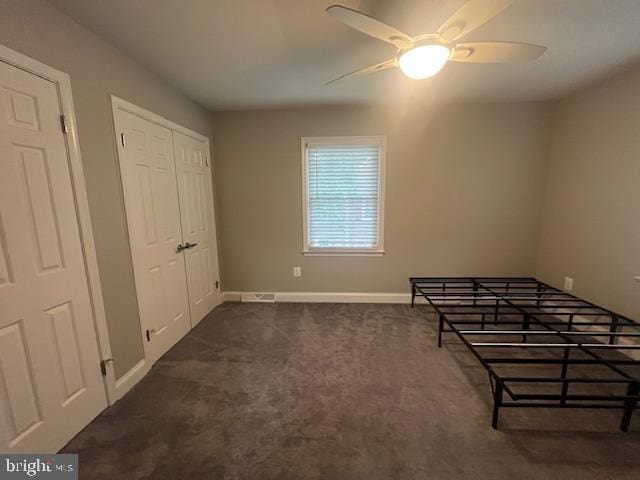 474 Colonial Ridge Ln, Arnold, MD 21012 - unfurnished bedroom with dark carpet and baseboards