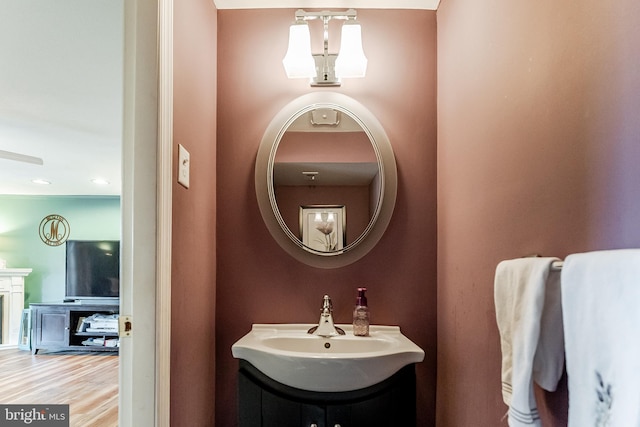bathroom featuring vanity and wood finished floors