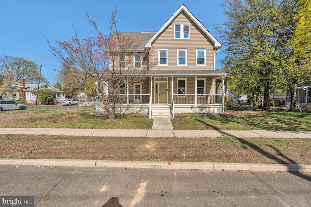 700 Pennsylvania Ave, Delanco, NJ 08075 - view of front of house featuring a porch and a front yard