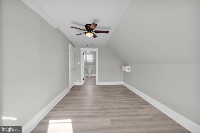 700 Pennsylvania Ave, Delanco, NJ 08075 - additional living space with baseboards, a ceiling fan, light wood finished floors, and lofted ceiling