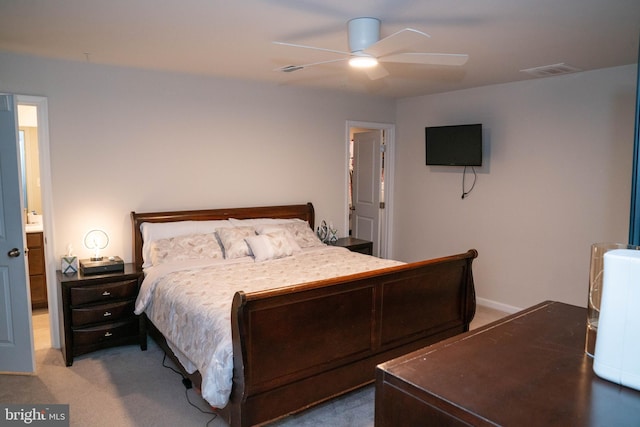 bedroom with light colored carpet, visible vents, ceiling fan, and baseboards