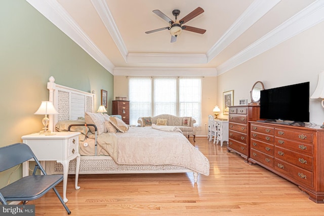 25 Easton Ave, Ocean Pines, MD 21811 - bedroom with light wood-style floors, ceiling fan, crown molding, and a raised ceiling
