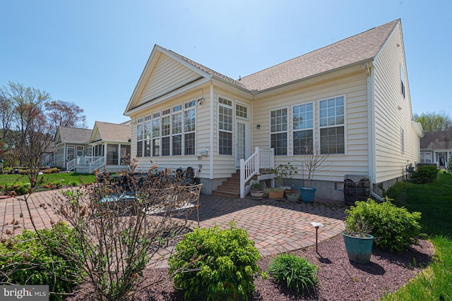 25 Easton Ave, Ocean Pines, MD 21811 - rear view of property with a patio area and a sunroom