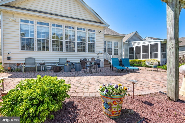 25 Easton Ave, Ocean Pines, MD 21811 - view of patio / terrace featuring a sunroom and entry steps