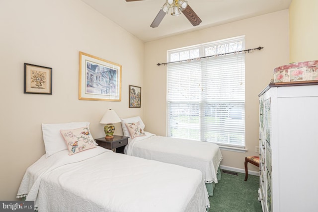 25 Easton Ave, Ocean Pines, MD 21811 - bedroom with dark carpet, baseboards, and a ceiling fan