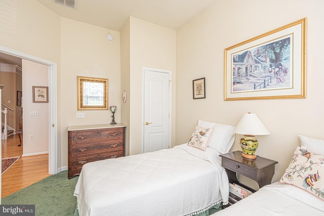 25 Easton Ave, Ocean Pines, MD 21811 - carpeted bedroom with baseboards, visible vents, and a towering ceiling