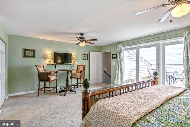 bedroom with access to outside, baseboards, a ceiling fan, and carpet floors