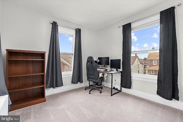 office with carpet flooring and baseboards